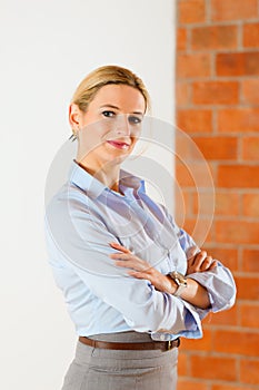 Realtor standing in empty apartment