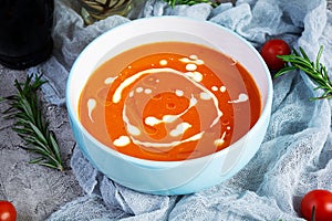 Ð¡ream soup of tomatoes and pepper. Hot tomato soup in bowl