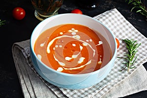 Ð¡ream soup of tomatoes and pepper. Hot tomato soup in bowl