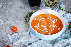 Ð¡ream soup of tomatoes and pepper. Hot tomato soup in bowl