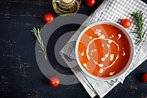 Ð¡ream soup of tomatoes and pepper. Hot tomato soup in bowl. Top view