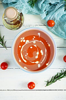 Ð¡ream soup of tomatoes and pepper. Hot tomato soup in bowl. Top view