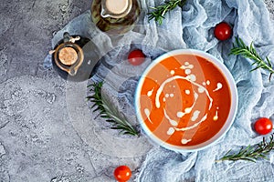 Ð¡ream soup of tomatoes and pepper. Hot tomato soup in bowl. Top view