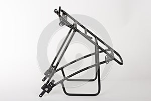 Rear bike rack made from aluminium square profile, studio photo, isolated on white background.