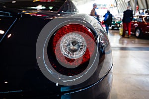 The rear brake lights of sports car Ferrari 599 GTB Fiorano F1, 2008.