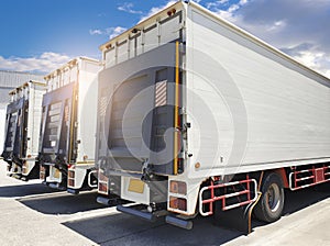 Rear of door hydraulic lift truck on parking at the warehouse. Cargo freight truck transport and logistics