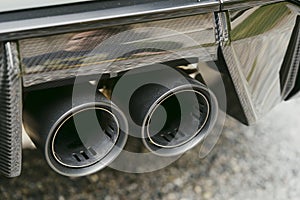 Rear exhaust pipe of a sports car