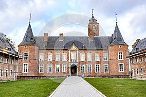 Rear facade of Alden Biesen Castle, brick walls, gable roof and two towers