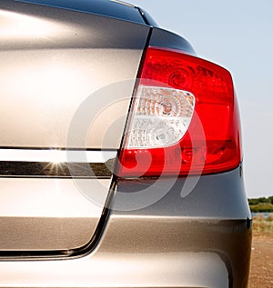 Rear headlight of a car in nature, a vehicle lighting element