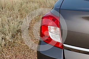 Rear headlight of a car in nature, a vehicle lighting element