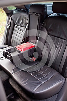 Rear leather seats with armrest in luxury car