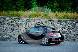 Rear left side view of cabriolet sport german car view from ground surface