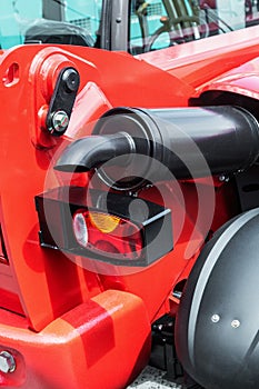 Rear lights and exhaust pipe on the tractor or excavator