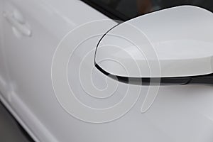 rear mirror of white car