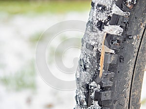 Rear mtb wheel with fat tire for extreme terrain.  Close up of a tire