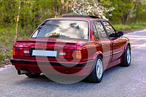 The rear of the old, red, German car