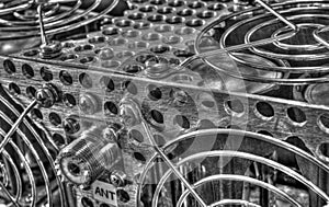 Rear panel of a high frequency power amplifier in black and white