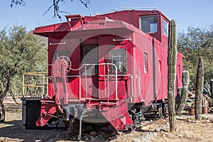 Rear Of Railroad Caboose In Arizona Desert