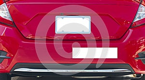 Rear of Red Car With Blank White License Plate and Bumper Sticker photo