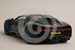 Rear side angle view of toy Bugatti Chiron sports car