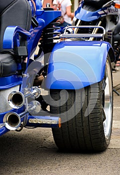 Blue trike metal details close up