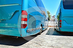 Rear side of two parked coaches