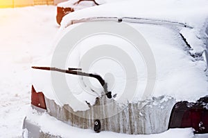 Rear snow-covered car window