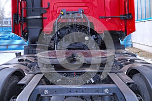 Rear of the tractor unit. Visible fifth wheel couplings are fitted to a tractor unit to connect it to the trailer