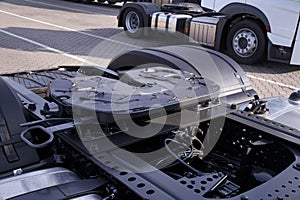 Rear of the tractor unit. Visible fifth wheel couplings are fitted to a tractor unit to connect it to the trailer