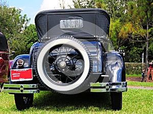 Rear view of 1928 Ford horseless carriage