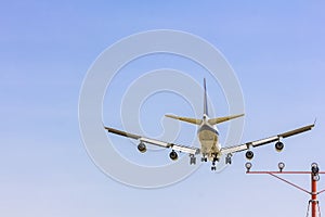 rear view of airplane for commercial passenger or cargo transportation fly and spread the wheel for landings to airport