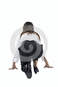 Rear view of Asian businesswoman in start position ready to run