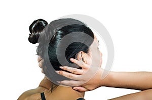 Rear view of brunette girl with hair bun