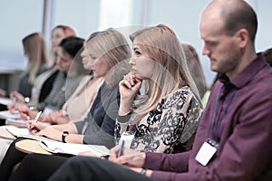 Rear view.businessmen sitting in a conference room