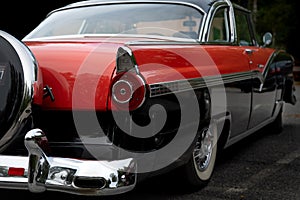 Rear view of a classic American car from the fifties