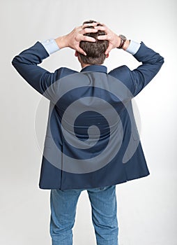 Rear view of a desperate man