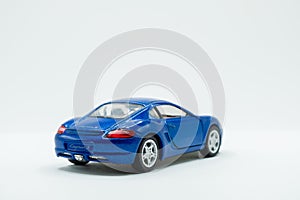 Rear view of fast blue car toy