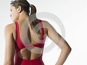 Rear View Of Female Swimmer In Red Swimwear