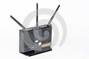 Rear view of gigabit dual-band  Wi-Fi router with  three antennas