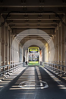 Rear view of Go North East bus heading across the Newcatsle High Level Bridge showing Victorian Metalwork
