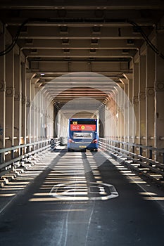 Rear view of Go North East bus heading across the Newcatsle High Level Bridge showing Victorian Metalwork