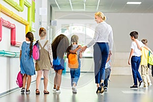 rear view of group of schoolchildren