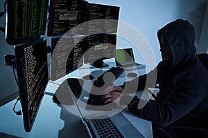 Hacker Using Computers To Steal Data