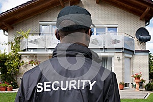 Rear View Of A Male Security Guard