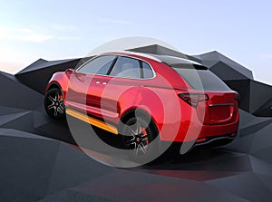 Rear view of metallic red electric SUV on geometric hard surface ground