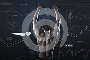 Muscular young man lifting two dumbbell