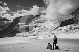 rear view of people on Aletsch glacier in Grindelwald Switzerland