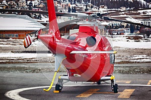 Rear view of a red helicopter in stmoritz switzerland