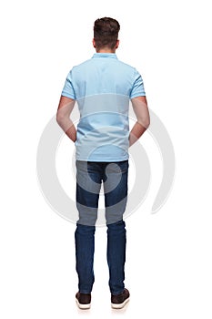 Rear view of relaxed casual man wearing blue polo shirt