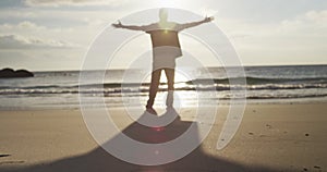 Rear view of a senior man at the beach